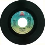 The stereo side of the single "Rock Hard," cross-promoted by Dreamland and RSO Records, from the Suzi Quatro "Rock Hard" promo pack, 1980. Text: DREAMLAND™ Records, Inc. HOLLYWOOD Chinnichap Publishing, Inc. (Admin. in the U.S.A. & Canada by Careers Music, Inc.) (BMI) Intro :17 3:23 PRODUCED BY MIKE CHAPMAN 25 PROMOTION COPY NOT FOR SALE STEREO DL 104 (DL 104 AS) Intl. # 2090 485 From the Soundtrack Album "TIMES SQUARE" RS-2-4203 and the Dreamland Album "ROCK HARD" DL-1-5006 ROCK HARD (M. Chapman-N. Quinn) SUZI QUATRO ℗ 1980 DREAMLAND RECORDS, INC. MANUFACTURED & MARKETED BY RSO RECORDS, INC. 8335 SUNSET BLVD., LOS ANGELES, CA 90069 [This digital surrogate was ceated by Sean Rockoff for robinjohnson.net.)
