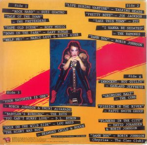 The back cover of the US edition of the "Times Square" Original Motion Picture Soundtrack Text: Side 1 "ROCK HARD" - SUZI QUATRO "TALK OF THE TOWN" - THE PRETENDERS" "SAME OLD SCENE" - ROXY MUSIC "DOWN IN THE PARK" - GARY NUMAN "HELP ME!" - MARCY LEVY & ROBIN GIBB Side 2 "LIFE DURING WARTIME" - TALKING HEADS "PRETTY BOYS" - JOE JACKSON "TAKE THIS TOWN" - XTC "I WANNA BE SEDATED" - THE RAMONES "DAMN DOG" - ROBIN JOHNSON Side 3 "YOUR DAUGHTER IS ONE" - ROBIN JOHNSON & TRINI ALVARADO "BABYLON'S BURNING" - THE RUTS "YOU CAN'T HURRY LOVE" - D.L. BYRON "WALK ON THE WILD SIDE" - LOU REED "THE NIGHT WAS NOT" - DESMOND CHILD & ROUGE Side 4 "INNOCENT, NOT GUILTY" - GARLAND JEFFREYS "GRINDING HALT" - THE CURE "PISSING IN THE RIVER" PATTI SMITH GROUP "FLOWERS IN THE CITY" - DAVID JOHANSEN & ROBIN JOHNSON "DAMN DOG" — ROBIN JOHNSON (Reprise - The Cleo Club) Album Executive Producer: Bill Oakes RSO® Records, Inc. © 1980 Butterfly Valley NV ℗ 1980 RSO Records Inc Manufactured and Marketed by RSO Records, Inc. Distributed by Polygram Distribution, Inc 810 7th Avenue, New York, New York l0019. All Rights Reserved. Unauthorized Duplication is a Violation of Applicable Laws. Also available on Cassette CT-2-4203 and 8 Track 8T-2-4203, RS-2-4203. 2658145, 2479264, 2479265