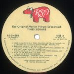 Label side 3 of 4 of the "Times Square" soundtrack album, US release. Text: The Original Motion Picture Soundtrack TIMES SQUARE RS-2-4203 (RS-2-4203CS) Record 2 SIDE 3 Intl. #2658 145 Indv. Intl. #2479 265 1. YOUR DAUGHTER IS ONE - ROBIN JOHNSON AND TRINI ALVARADO 2:10 (B. Mernit-N. Ross-J. Brackman) BMI ℗ 1980 RSO RECORDS, INC. 2. BABYLON'S BURNING - THE RUTS 2:34 (J. Jennings-D. Ruffy-M. owen-P. Fox) BMi ℗ 1979 VIRGIN RECORDS LTD. 3. YOU CAN'T HURRY LOVE - D.L. BYRON 3:04 (E. Holland-L. Dozier-B. Holland) BMI ℗ 1980 ARISTA RECORDS, INC. 4. WALK ON THE WILD SIDE - LOU REED 4:12 (L. Reed) BMI ℗ 1972 RCA RECORDS 5. THE NIGHT WAS NOT - DESMOND CHILD AND ROUGE 3:08 (D. Child) ASCAP ℗ 1979 CAPITOL RECORDS, INC. Album Executive Producer: Bill Oakes ℗ 1980 RSO RECORDS, INC. 49 MANUFACTURED & MARKETED BY RSO RECORDS INC. 8335 SUSNSET BLVD., LOS ANGELES, CA. 90069