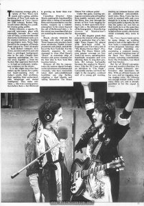 Illustrated article on TIMES SQUARE. Text: Two runaway teenage girls, a variety of New Wave rock music and a grimy, pristine backdrop of New York make up the ingredients of Times Square (an EMI release), Robert Stigwood’s latest offering to a youthful cinema-going public. Robin Johnson, a spunky 15-year-old newcomer, plays with admirable bravado the central role of Nicky, a street urchin with destructive inclinations and a yen for musical stardom. In hospital for psychiatric tests, Nicky finds herself in the company of Pamela Pearl (played by Trini Alvarado — from Robert Altman's Rich Kids), an introverted 12-year-old from a privileged background, also in for tests. Despite their opposing upbringings, the two run away together — from the System that oppresses them both — to lead an exuberant, retaliatory existence on the streets. It is this slight story-line that makes up the canvas for a gritty but heart-warming story of today's youth, their problems, their qualities, their understandable misgivings and denied intelligence. They make mistakes — like every young generation before them — but this breed is growing up faster than ever before. Canadian director Alan Moyle, making his American film debut after a string of successful films and documentaries over the border, conjures up a realistic atmosphere to his scenes beyond the call of Hollywood duty — to the extent you sometimes feel you are watching the runaway duo for real. Moyle cleverly intercuts his footage with shots of genuine Times Square coke snorters, back street alcoholics, Eighth Avenue prostitutes and pimps, and all the fun of the New York fair. For the climactic sequence he even managed to close 42nd Street’s “Deuce” (a notorious strip of theatres and porno cinemas) for the first time in New York film location history. Between all this he concentrates his camera almost lovingly on the adventures of Johnson and Alvarado, who have meanwhile taken their anti-establishment hostilities one step further, adopting a dual identity and calling themselves The Sleaze Sisters Not without point! Under this guise, wearing outrageous costumes pieced together from jumble outcasts and dustbin liners, they tear through the streets of New York begging for money, in their spare time levering tv sets — the ultimate symbol of the bourgeoisie — from the top storeys of Manhattan's skyscrapers. It is this singular prank that arouses the interest of the public, and in particular that of a late-night Times Square DJ, played with laid-back relish by England's own Tim Curry, late of “The Rocky Horror Show”. Providing The Sleaze Sisters with even greater coverage on New York’s air waves, narrating their boardwalk escapades and even allowing them to sing their protests, DJ Johnny LaGuardia becomes the catalyst in Moyle's story. Like the DJ Curry played on television in “City Sugar”, LaGuardia reaches out from the night to the receptive, confused soul of a young girl wanting, desiring an intimate liaison with an established anti-establishment voice. Here, Curry has two souls to contend with and, even though he is trying to help them and gain public sympathy (by this time the police are now hot on their trail), he is at the same time exploiting them, exploiting their isolation from society, the society which eventually they come to need. So, Times Square turns out to be many things: an exciting, abrasive look at the uglier face of New York; a compassionate tale of two desperate runaways who find mutual friendship encountering a common enemy; and a musical featuring some of the finest New Wave sounds around, including contributions from The Pretenders, Lou Reed and Suzi Quatro. But for all Moyle’s perspicacious and sensitive direction, it is young Robin Johnson's performance that dominates the film. With an off-beat beauty all her own, and an engaging rasping singing voice, Ms Johnson has enough female virility to fill many films yet, and is already pencilled in for the sequel to Grease.