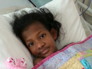 Celestina recovering after heart surgery at the RCH Melb