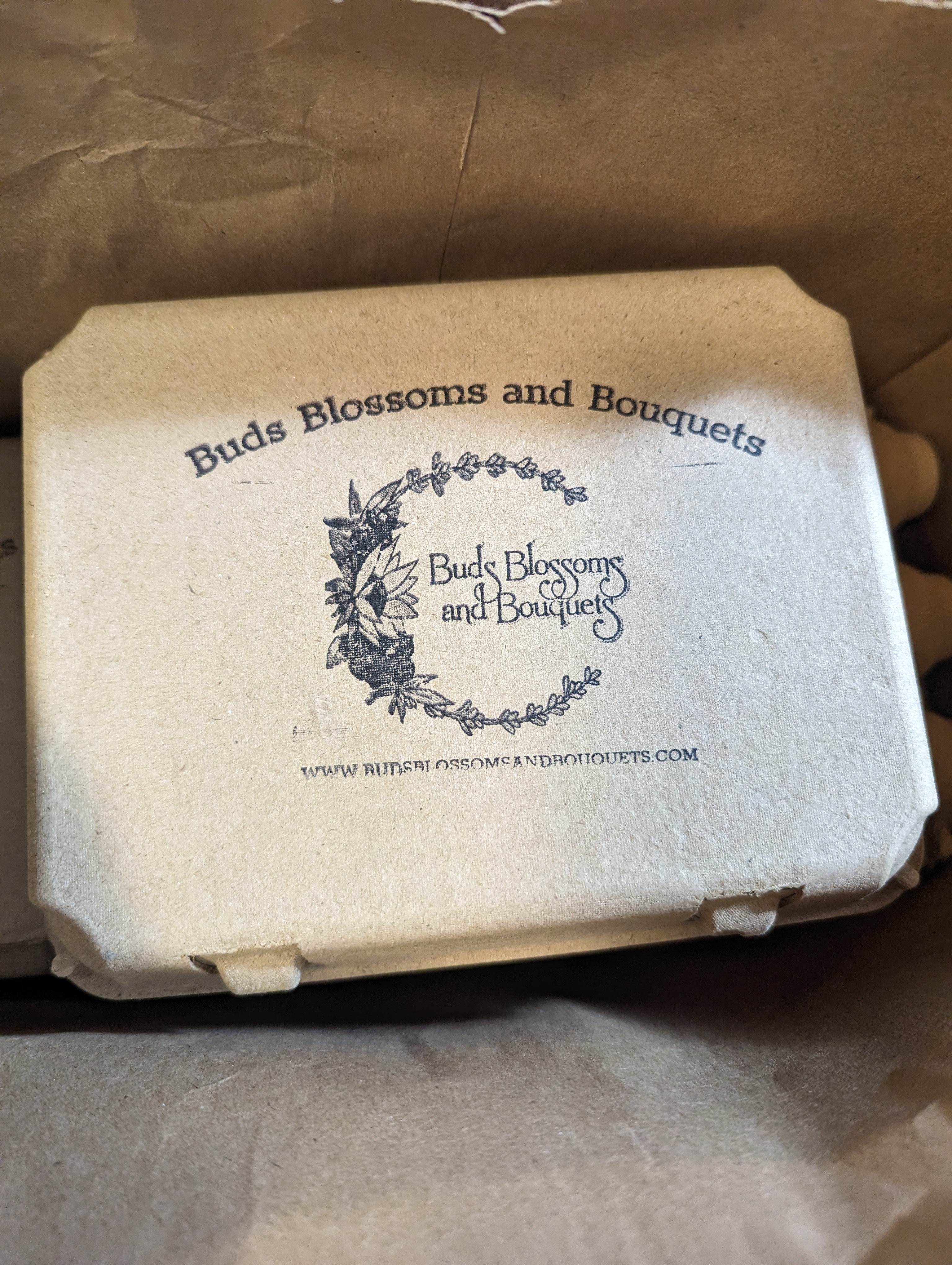 Buds Blossoms and Bouquets Logo