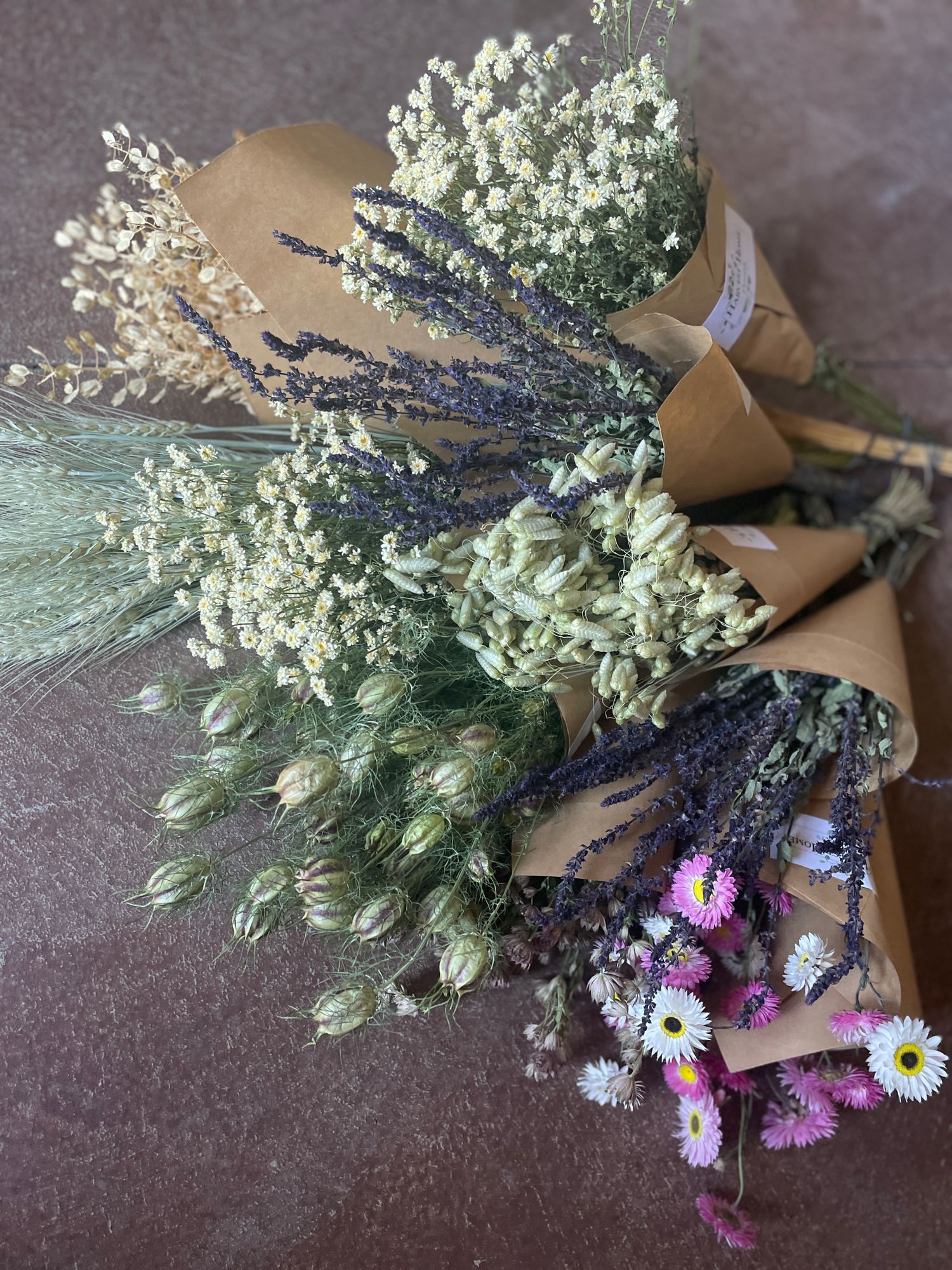 Variety of bunches of dried florals.