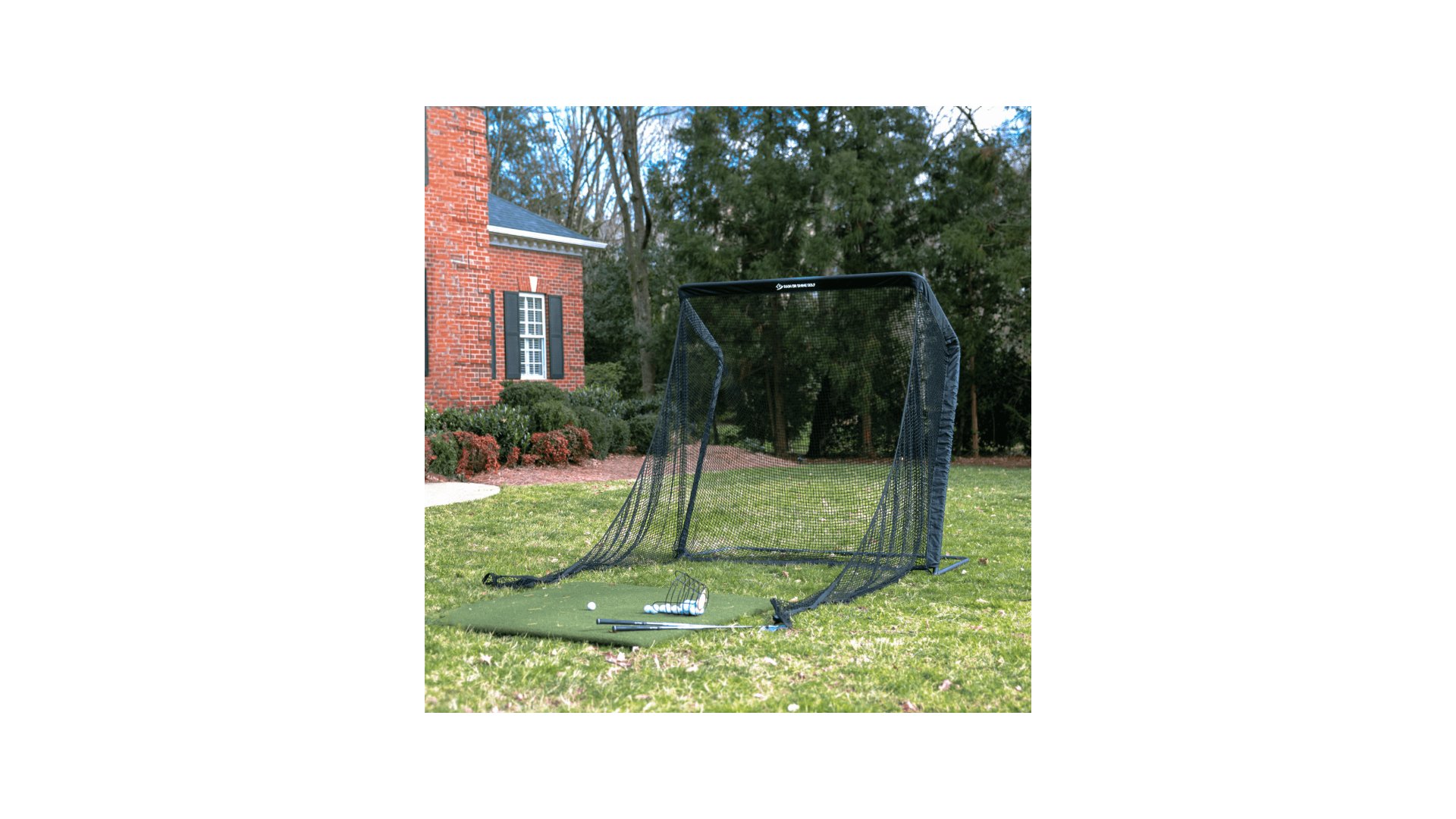 SwingNet Pro outdoor setup with ball return visible