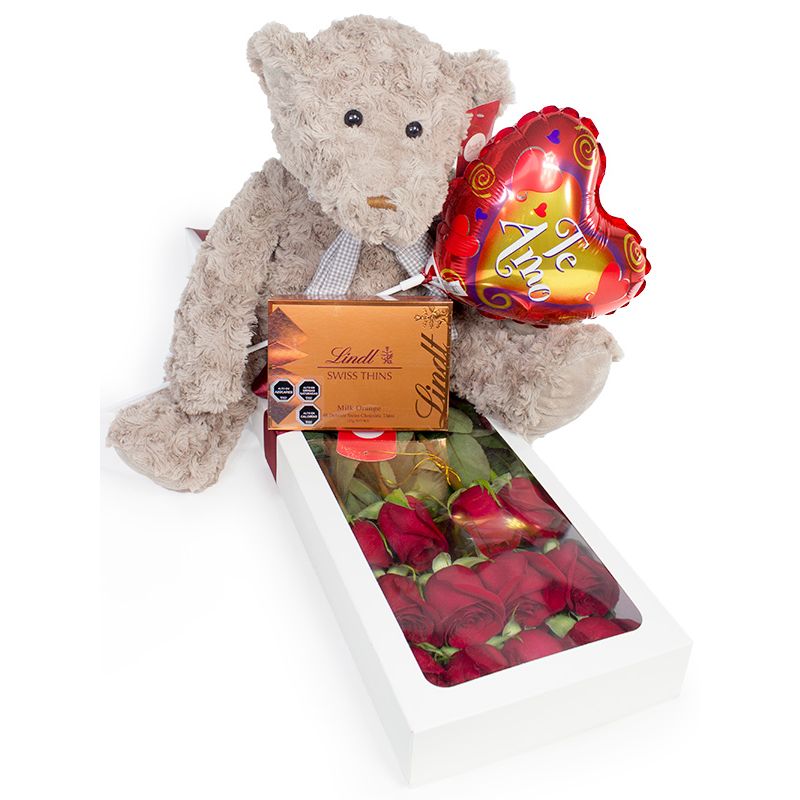 Flores a domicilio - Caja con 12 rosas rojas mas Osito Teddy más globo varilla te amo y Lind Swiss Thins milk orange 125g Flores a domicilio - Caja con 12 rosas rojas mas Osito Teddy más globo varilla te amo y Lind Swiss Thins milk orange 125g