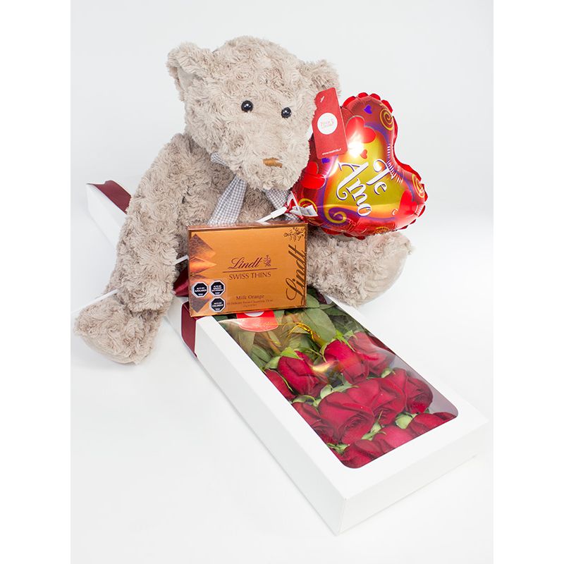 Foto 4 Caja con 12 rosas rojas mas Osito Teddy más globo varilla te amo y Lind Swiss Thins milk orange 125g - Flores a domicilio Foto 4 Caja con 12 rosas rojas mas Osito Teddy más globo varilla te amo y Lind Swiss Thins milk orange 125g - Flores a domicilio