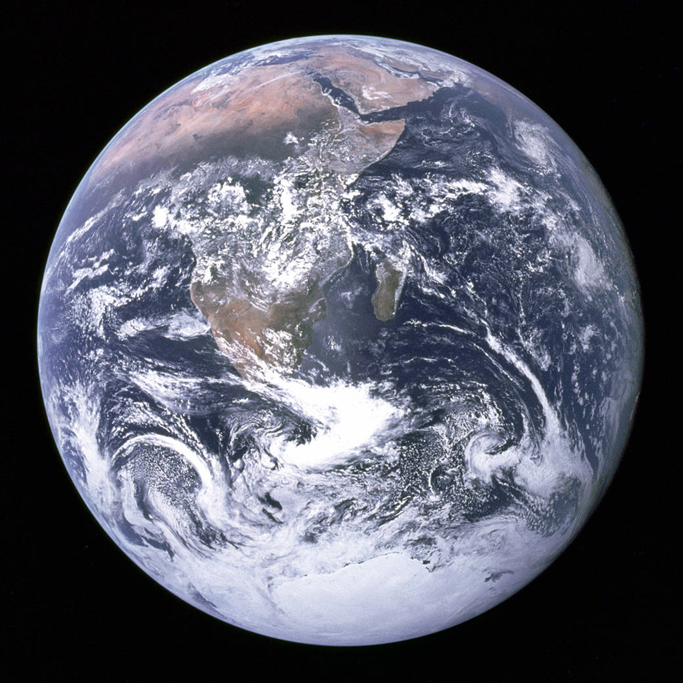 View of the Earth as seen by the Apollo 17 crew -- astronaut Eugene A. Cernan, commander; astronaut Ronald E. Evans, command module pilot; and scientist-astronaut Harrison H. Schmitt, lunar module pilot -- traveling toward the moon. This translunar coast photograph extends from the Mediterranean Sea area to the Antarctica South polar ice cap. This is the first time the Apollo trajectory made it possible to photograph the South polar ice cap. Note the heavy cloud cover in the Southern Hemisphere. Almost the entire coastline of Africa is clearly visible. The Arabian Peninsula can be seen at the Northeastern edge of Africa. The large island off the coast of Africa is the Malagasy Republic. The Asian mainland is on the horizon toward the Northeast.