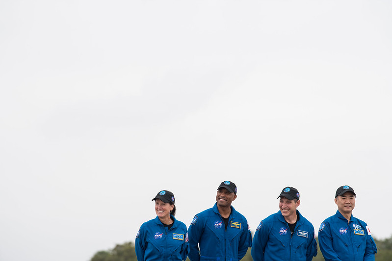 NASA astronauts Shannon Walker, left, Victor Glover, second from left, Mike Hopkins, second from right, and JAXA astronaut Soichi Noguchi, right, are seen after arriving at the Launch and Landing Facility at NASA’s Kennedy Space Center ahead of SpaceX’s Crew-1 mission on Nov. 8 in Florida. Credits: NASA/Joel Kowsky