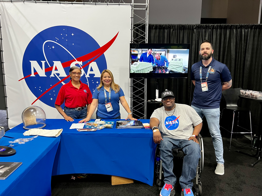 Volunteers from NASA’s Johnson Space Center join to celebrate the NCAA Fan Fest at the George R. Brown Convention Center.