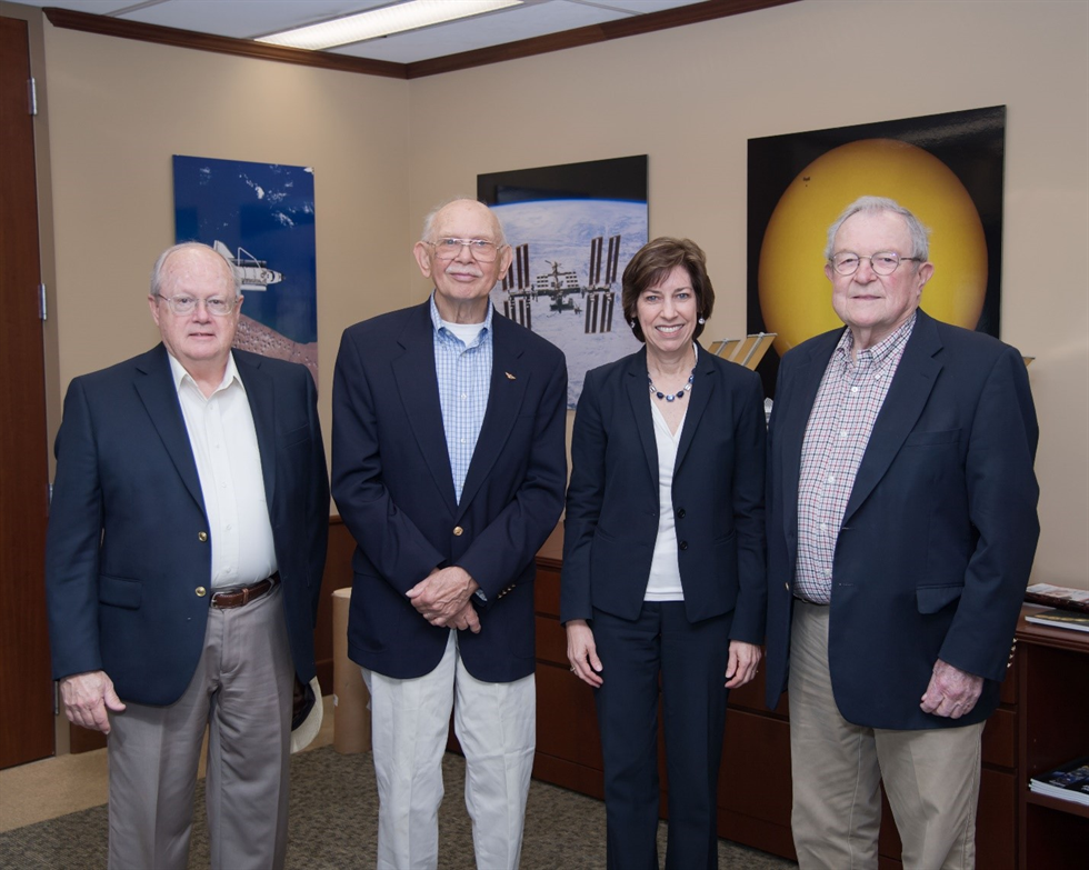 Members of the Gallaudet 11 with Center Director, Ellen Ochoa. From left to right: James Greenmum (son of Robert Greenmum), Harry Larson, Ellen Ochoa, and David Myers. Image Credit: NASA