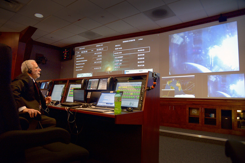 As Orion reaches an apogee of 3,600 miles, Orion Program Manager Mark Geyer watches the view from Orion's windows. Image Credit: NASA/Radislav Sinyak