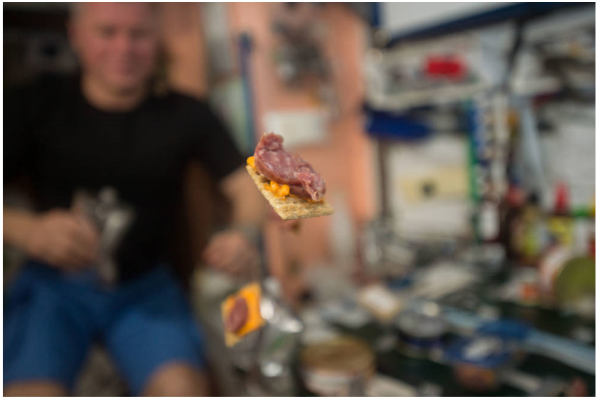 Snacks float freely aboard the International Space Station. Credits: NASA 