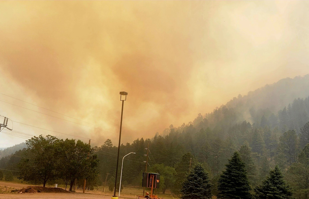 Wildfire haze is pictured over the Sierra Blanca mountain range in Ruidoso, New Mexico.