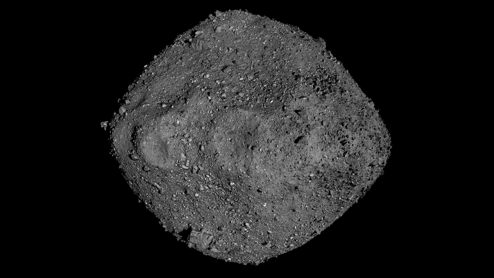 An image of a grey asteroid in front of a black background.