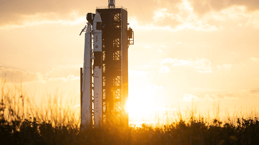 The SpaceX Falcon 9 rocket with the Crew Dragon Endeavour atop is pictured during a sunset at NASA’s Kennedy Space Center in Florida. Credit: NASA/Joel Kowsky