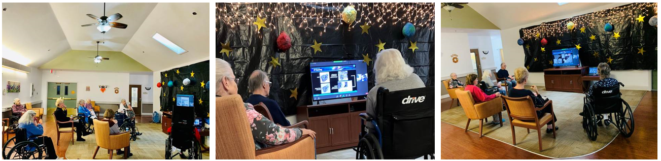 Seniors at a senior living center eagerly watch the NASA presentation. 