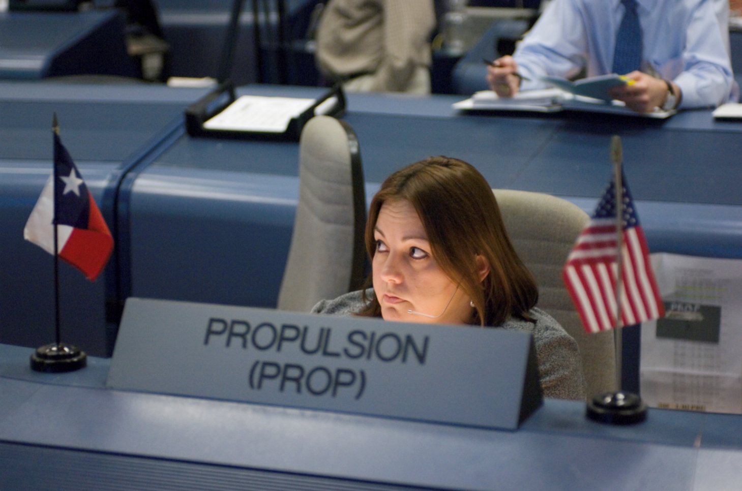 Sara Stewart at the Propulsion, or PROP, console in the White Flight Control Room in Building 30 during STS-120. Credits: NASA