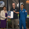 Man receiving an award.