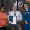 Man receiving an award.