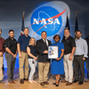 Group of people receiving an award