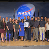 Group of people receiving an award