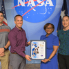 Group of people receiving an award