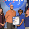 Group of people receiving an award