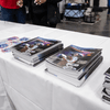 Photos of children and their families enjoying a holiday event that featured NASA astronauts and activities.