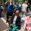 A crowd of people outside or in a lobby celebrating the 2024 eclipse in Texas. 