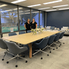 Images of people gathering in an open space in a newly renovated building.