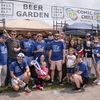 A group of people gather outside for a chili cook-off.