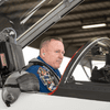 Two astronauts prepare to fly on T-38 jets.