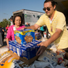 JSC volunteers 'Stuff the Truck' at the Gilruth Center, Aug. 31 as part of the annual food drive. Image credit: NASA/James Blair.