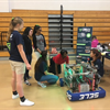 Annette Moore, Johnson Space Center's Chief Information Officer and director of the Information Resources Directorate, engages with students at a Girls in STEM event hosted by the Klein Independent School District. Images courtesy of Klein ISD. 