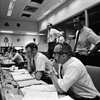 Mission control in Houston during the first day of the Apollo 10 mission. Seated in the foreground, from left, are Flight Directors Glynn Lunney and Gerald Griffin. Image Credit: NASA