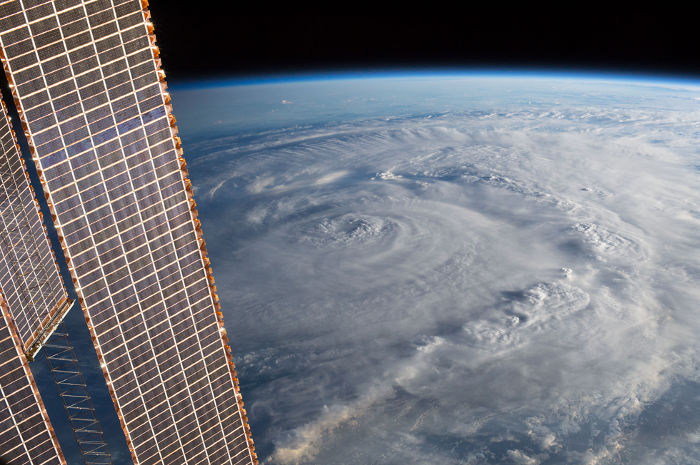 View of Hurricane Harvey (possibly over Texas) taken by the Expedition 52 crew aboard the International Space Station. Part of a solar array is also visible. Image Credit: NASA