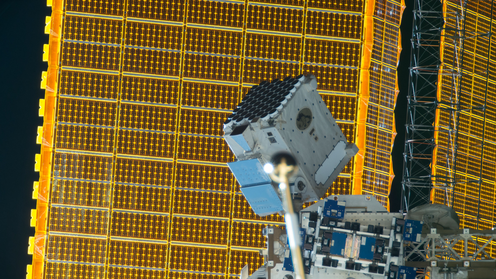 The NICER (Neutron star Interior Composition Explorer) payload is attached to ExPRESS (Expedite the Processing of Experiments to Space Station) Logistics Carrier-2 (ELC-2) on the S3 truss. Photo was taken by the ground-controlled External High Definition Camera 1 (EHDC1). Credit: NASA