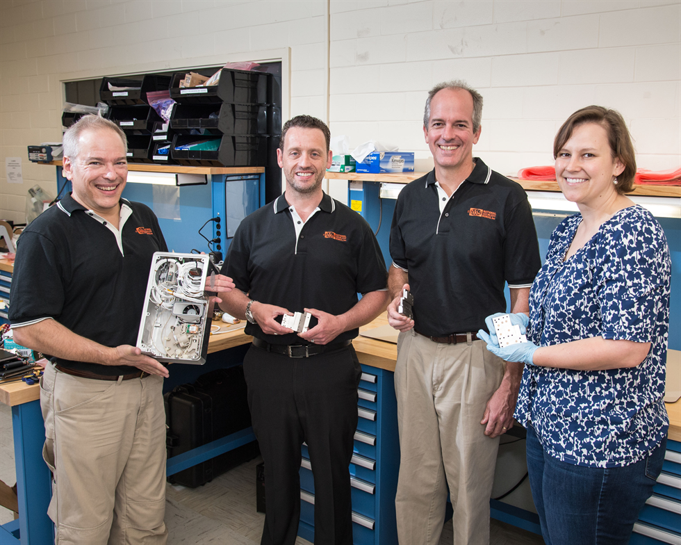 From left: NKW team members Bill Cox, Brian Cruickshank and Alec Wolk with NASA engineer Rachel Edgerly.