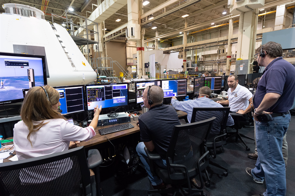 In this group of images, the AA-2 launch abort vehicle test team monitors the Orion crew module's integrated systems as the vehicle is powered on in preparation for a future flight test simulation. Image Credit: NASA/Robert Markowitz