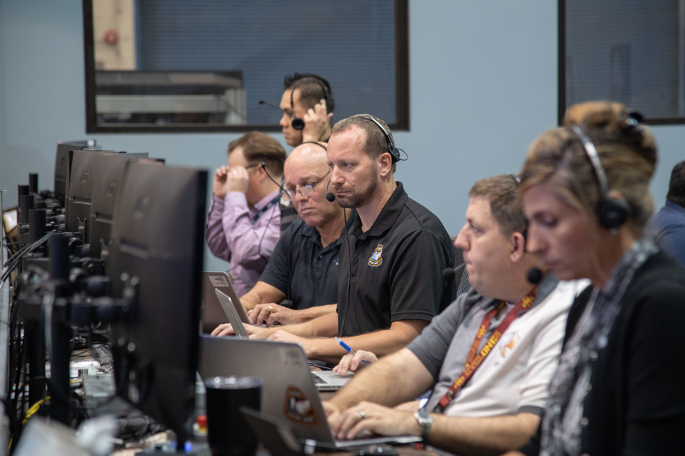 Dr. Jon Olansen (center) trains as a flight controller for the AA-2 launch scheduled for spring 2019.