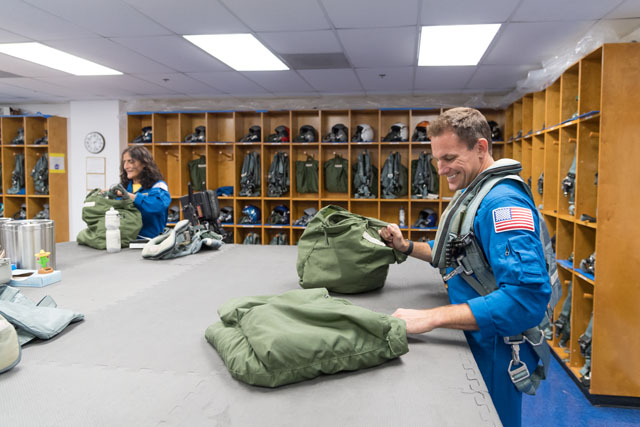 Williams and Cassada suit up for a T-38 flight