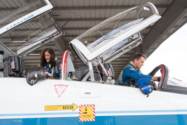 Williams and Cassada perform pre-flight checkouts before their T-38 flight.