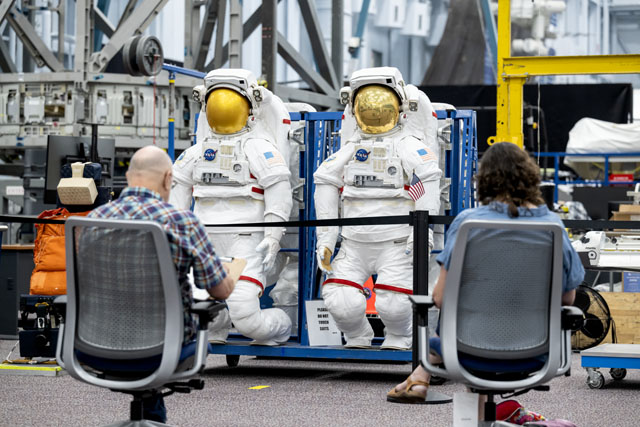 People sketching spacesuits at NASA