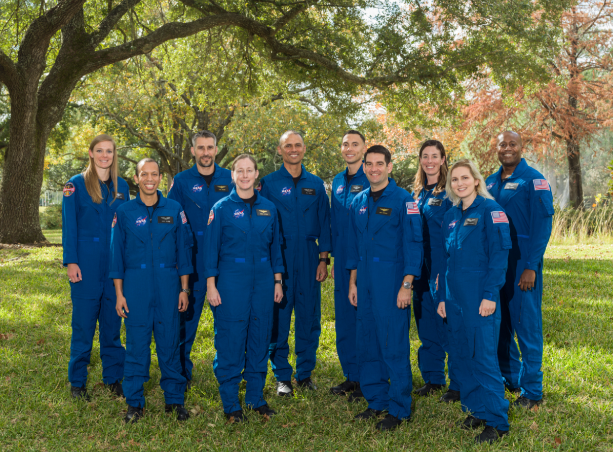 NASA announced its 2021 Astronaut Candidate Class on Dec. 6, 2021. The 10 candidates, pictured here at NASA’s Johnson Space Center in Houston, are: U.S. Air Force Maj. Nichole Ayers, Christopher Williams, U.S. Marine Corps Maj. (retired) Luke Delaney, U.S. Navy Lt. Cmdr. Jessica Wittner, U.S. Air Force Lt. Col. Anil Menon, U.S. Air Force Maj. Marcos Berríos, U.S. Navy Cmdr. Jack Hathaway, Christina Birch, U.S. Navy Lt. Deniz Burnham, and Andre Douglas. Credits: NASA