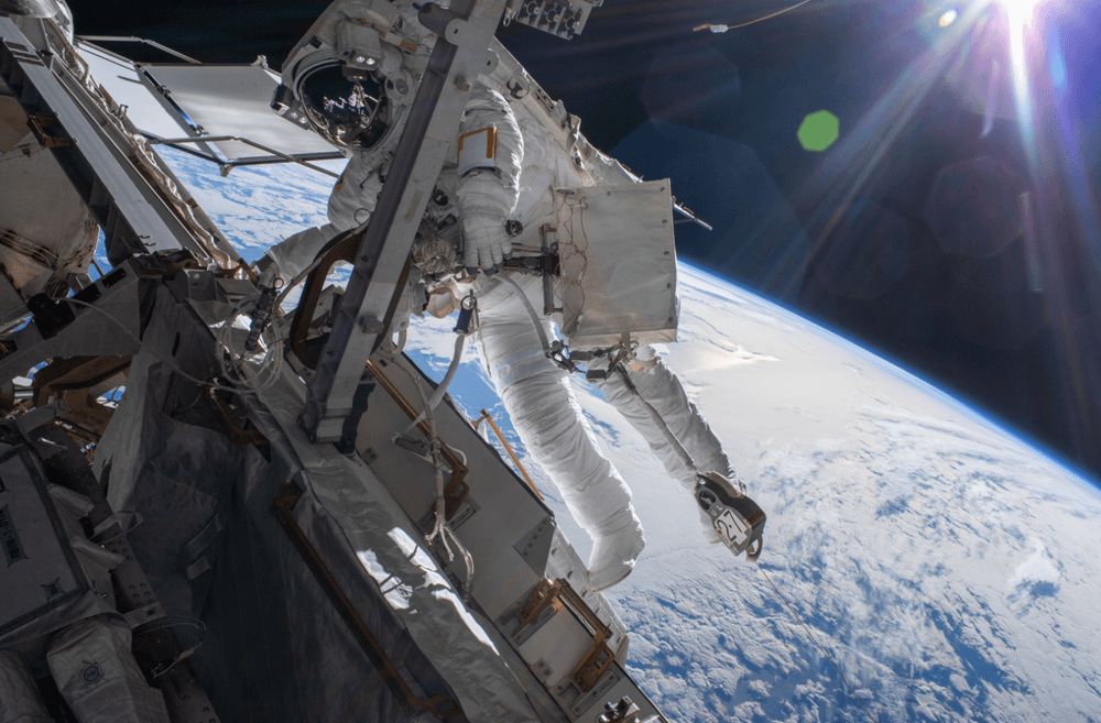 Astronaut Matthias Maurer of ESA (European Space Agency) is pictured on the International Space Station's truss structure during a spacewalk to install thermal gear and electronics components on the orbiting lab. Credits: NASA