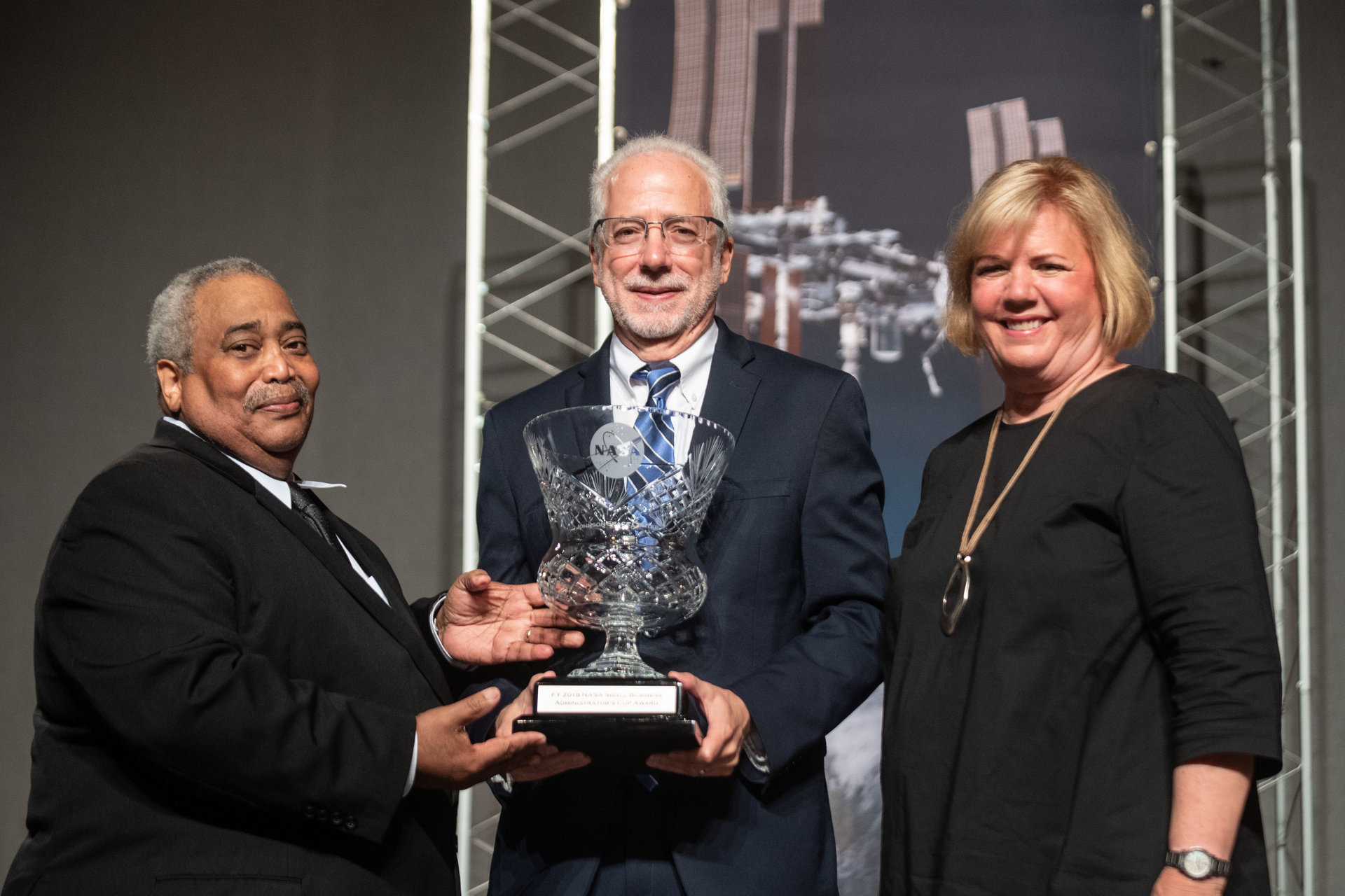 NASA’s Johnson Space Center Director, Mark Geyer, accepted the cup on behalf of the Johnson team on Tuesday prior to the Associate Administrator Town Hall.  