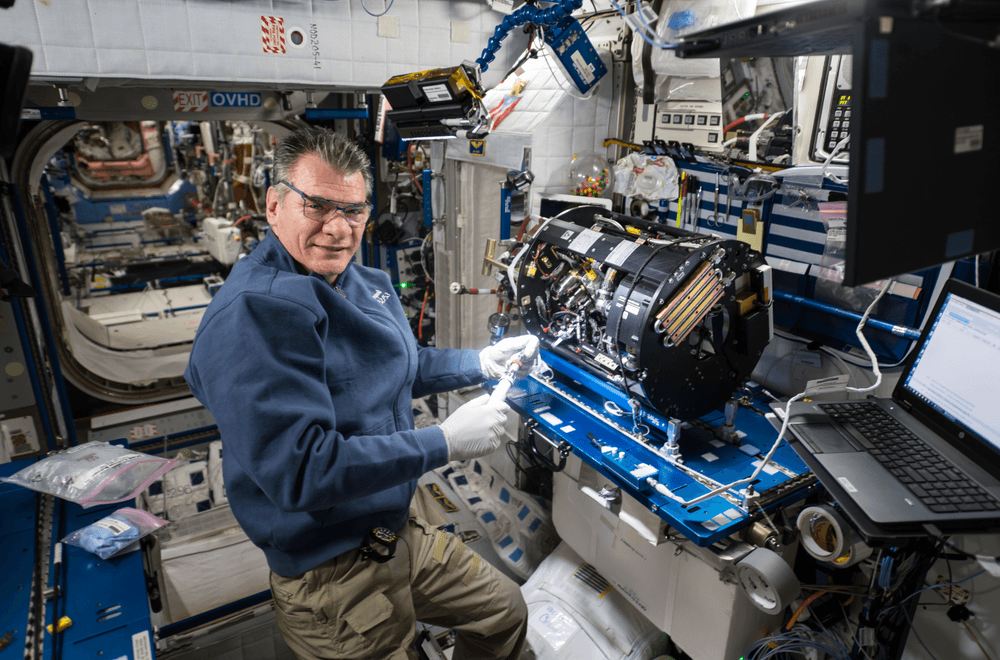 Flight Engineer Paolo Nespoli works inside the Harmony module to configure the Combustion Integrated Rack and enable the Advanced Combustion Microgravity Experiment, or ACME. Credits: NASA