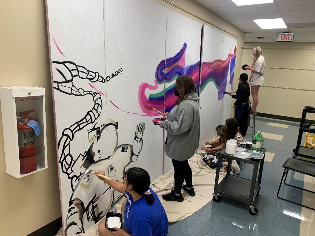 Students worked hard throughout the last two weeks of school to complete the mural. Courtesy of Friendswood High School.