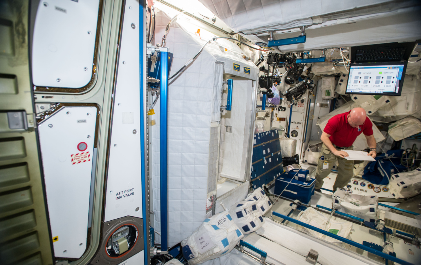 NASA astronaut Scott Kelly is shown during the collection of surface and air samples using various devices in multiple locations to characterize the types of microbial populations on the space station for the Microbial Observatory-1 payload. Credits: NASA