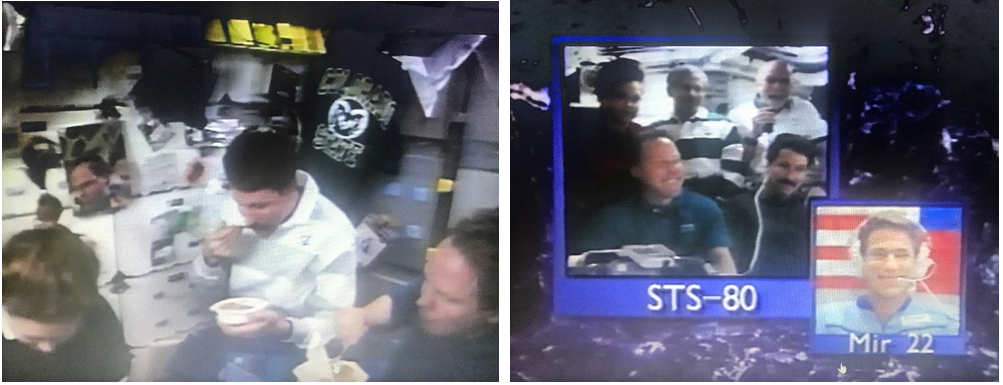 Thanksgiving 1996. Left: STS-80 astronauts Tamara E. Jernigan, left, Kent V. Rominger, and Thomas D. Jones enjoy Thanksgiving dinner in Columbia’s middeck. Right: The STS-80 crew during aboard Columbia exchange Thanksgiving greetings with John E. Blaha aboard the Mir space station. Credits: NASA